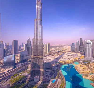 a rendering of the burj khalifa tallest building in the world at GRANDE SIGNATURE with a direct Burj Khalifa view and Private Fountain Show at 62nd floor with DXB AIRPORT VIP Shuttle option for 6 guests in Dubai