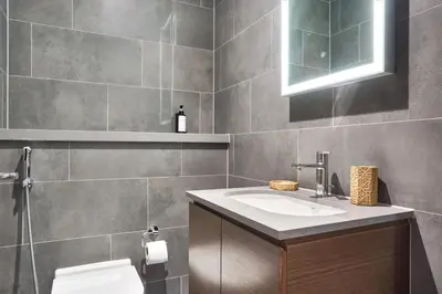 a bathroom with a sink and a toilet at STAY BY LATINEM Luxury 1BR Plus Holiday Home CB 1412 Near Burj Khalifa in Dubai