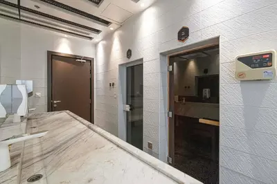 a bathroom with a marble counter in a room at Stylish Studio Business Bay Near Dubai Mall in Dubai