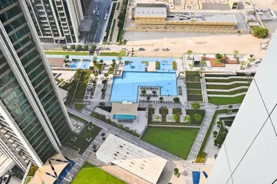 an aerial view of a city with buildings at Golden Stays - Stunning Downtown 2Br with Full Burj Views & Free Parking in Dubai