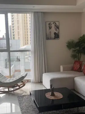 a living room with a couch and a coffee table at Prime Downtown 3 BDR-2 mn to Dubai Mall in Dubai