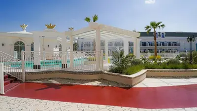a building with a pavilion in front of a building at Vincitore Benessere - Arjan by Golden Casa in Dubai