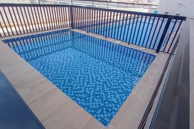 an overhead view of a swimming pool at StayShort - Stunning 2BR Apartment in Jebel Ali Village in Dubai