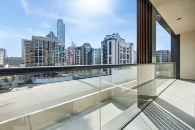 a balcony with a view of the city at Modern 1BR Near World Trade Center Metro in Dubai