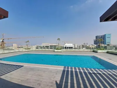a swimming pool on the roof of a building at Vacationer I Premium 2 Bedroom Apartment I Close to DIFC & WTC I Central Location in Dubai