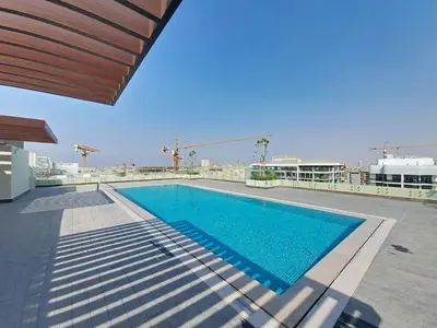 a swimming pool on the roof of a building at Vacationer I Premium 2 Bedroom Apartment I Close to DIFC & WTC I Central Location in Dubai