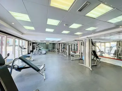 a gym with several treadmills and cardio machines at Vacationer l Upgraded Chic 2 Bed l Pool View l Free Pool, Gym Access in Dubai