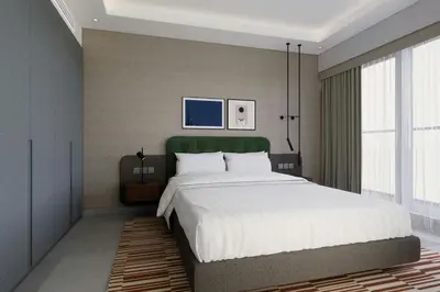 a bedroom with a large bed and a large window at Marriott Executive Apartments Jumeirah Lakes Towers, Dubai in Dubai