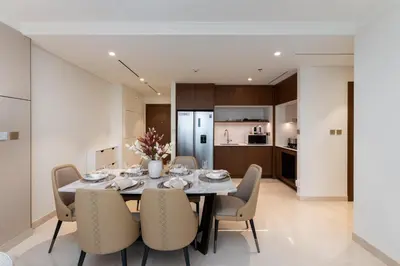 a dining room with a table and chairs at Palace Beach Residence 2, Emaar Beachfront - Mint Stay in Dubai