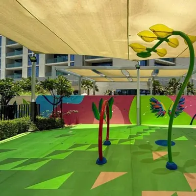 a room with a painting of flowers and plants at Dubai Business Bay Luxurious Studio with Canal View and access to Lagoon Pool in Dubai