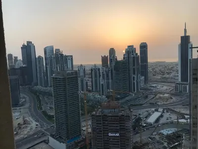 a view of a city skyline with skyscrapers at Skyline 43 - Penthouse Burj Khalifa View & Pool in Dubai