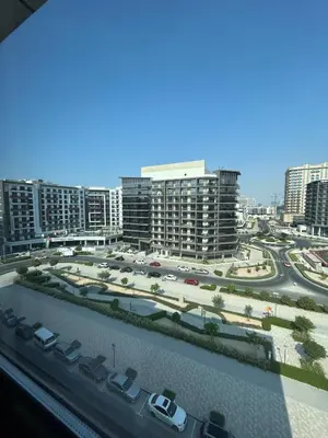a view of a parking lot in a city with buildings at Modern apartment Dubai in Dubai
