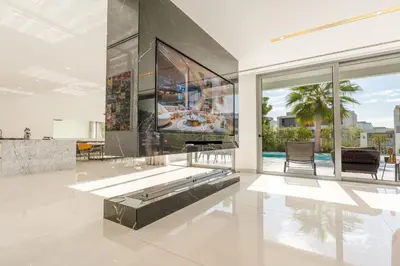 a large living room with a large screen tv at Premium Sidra Villa with Private Pool and Exclusive Stay in Dubai