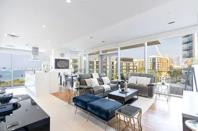 an open living room with a view of the ocean at Bluewaters 2B Iconic Ain Dubai and Sea View in Dubai