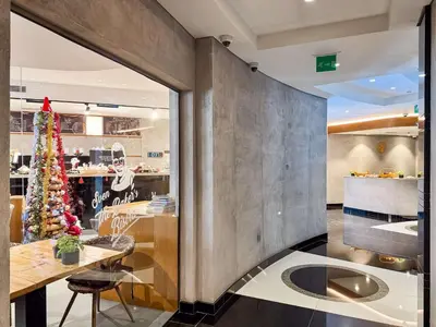 a restaurant with a christmas tree on the counter at PVH - Iconic Waterfront Escape - Luxury 2BR with Sea Views - DUBAI MARINA in Dubai