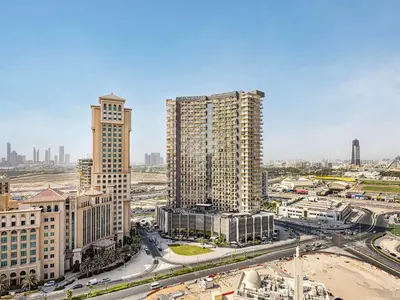 an aerial view of a city with tall buildings at Livin' Holidays - 2BR - Skyline View with Burj Glimpse in Dubai