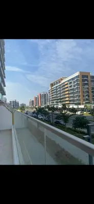 a view of a city with tall buildings and a street at Holiday homes azizi riviera in Dubai