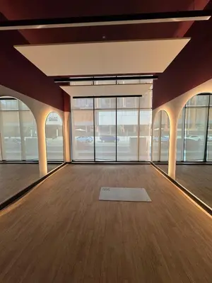 a large room with a white mat on the floor at Peaceful Modern Home Overlooking JVC Green Park in Dubai