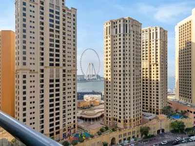 a view of a city with tall buildings at Luxury Waterfront View w Ain Dubai and PS5 in JBR 5 min from the beach in Dubai