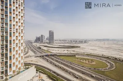 an aerial view of a highway in a city at Mira Holiday Homes - High View 2 Bed Oasis at Nobles Tower with Sauna in Dubai