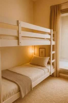 a bedroom with two bunk beds and a window at TravelTime Marina in Dubai