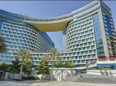 a large office building with a large building at Séjour raffiné et inoubliable in Dubai