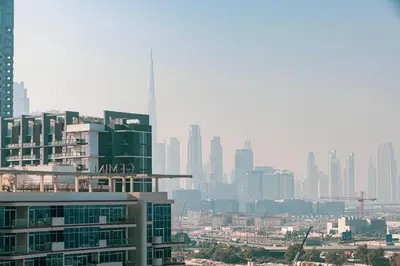 a view of a city skyline with a large building at Luxurious Crest Tower Suites By Hostiva- Burj View in Dubai