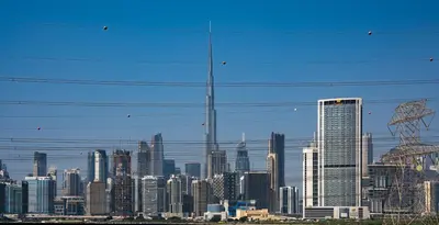 a view of a city skyline with skyscrapers at Elegant & Spacious 2-BR Hideaway Riviera Bliss in Dubai