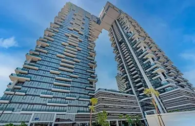 a large apartment building with a tall building at 1-Bedroom Apartment near Dubai Frame High Floor in Dubai