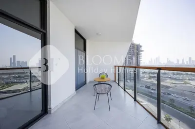 a balcony in a building with a table at 202-Bloomfields Iconic 1br Binghatti Avenue in Dubai