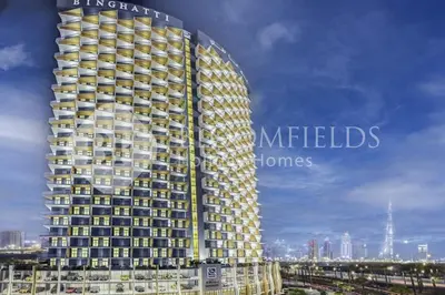 a rendering of a tall building with yellow windows at 202-Bloomfields Iconic 1br Binghatti Avenue in Dubai