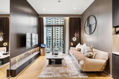 a living room with a couch and a table at Ultra Luxury! Burj Crown ! 1BR ! Beautiful View in Dubai