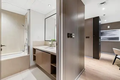 a bathroom with a sink and a shower and a tub at Ultra Luxury! Burj Crown ! 1BR ! Beautiful View in Dubai