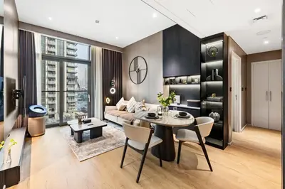 a living room with a table and a couch at Ultra Luxury! Burj Crown ! 1BR ! Beautiful View in Dubai