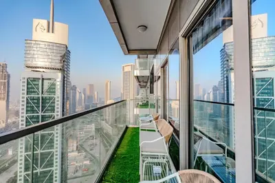 a balcony with a view of a city skyline at Paramount Midtown Luxury 2BR Sleeps 7 Near Business Bay Metro and Dubai Mall in Dubai