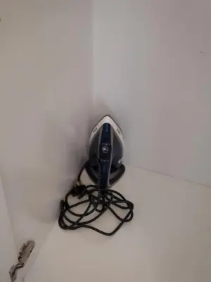 a wire hooked up to a mouse on a wall at Bright 2BR Apartment 5-Min Walk to Metro & Mall 1124 in Dubai