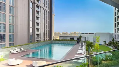 a view of a swimming pool in a building at Creek Vista Elegance-1BRBurj Khalifa View in Dubai