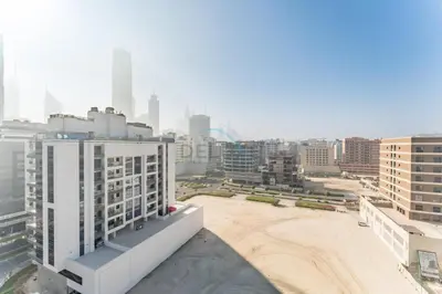 an aerial view of a city with tall buildings at Minutes from City Walk, Downtown Dubai and Jumeirah Beach, Easy Access to Metro Stations and Major Roads - Arista One, Al Satwa by Deluxe Holiday Homes in Dubai
