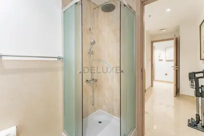 a shower with a glass door in a bathroom at Full Yacht Harbour and Marina Canal Views, Walking Distance to Tram Station and Beach - Shemara W2, Dubai Marina by Deluxe Holiday Homes in Dubai
