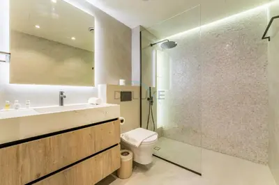 a bathroom with a sink and a toilet and a shower at Full Yacht Harbour and Marina Canal Views, Walking Distance to Tram Station and Beach - Shemara W2, Dubai Marina by Deluxe Holiday Homes in Dubai