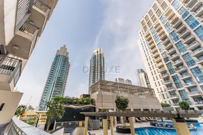 a view of tall buildings in a city at Walk from Burj Khalifa and Dubai Mall, and Conveniently Located near the Metro Station - BD Standpoint A, Downtown by Deluxe Holiday Homes in Dubai