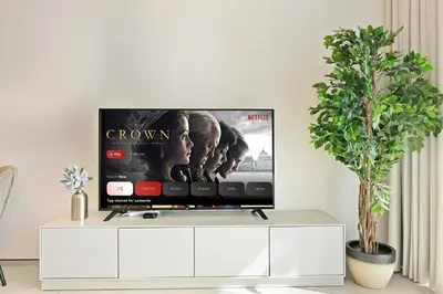 a flat screen tv sitting on top of a white cabinet at Brand New 1BD in Address JBR, Relaxing Stay for 2 in Dubai