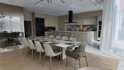 a kitchen and dining room with a table and chairs at World Class 6 BDR Villa In Signature Palm in Dubai