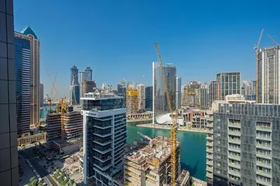an aerial view of a city with tall buildings at Chic Studio Canal Side Speedy wi-fi BBay in Dubai