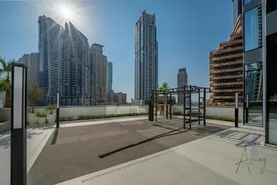 a view of a city skyline with tall buildings at Luxe 2BR Maid High Floor LIV Marina Dream in Dubai