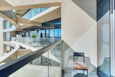 a chair sitting in the middle of a building at PVH - City View Contemporary 2BR - Aykon Tower C in Dubai