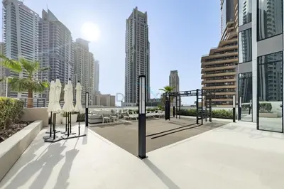 a balcony with a view of a city skyline at Luxury 1BR with Pool and Stunning Marina Views, Perfectly Located Minutes from the Beach, Tram, and Mall, LIV Marina, Dubai Marina by Deluxe Holiday Homes in Dubai