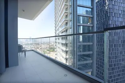 a balcony in a building with a view of a city at Prime Stay Elite, Dubai Mall & Burj Khalifa View in Dubai