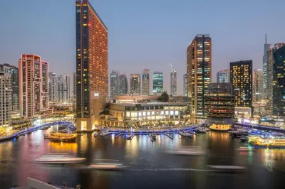 a view of a city with a river and buildings at FIRST CLASS 1BR Scenic Marina Views in Dubai
