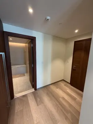 an empty room with a door and a closet at Magical Views Downtown Lux 2 BR Urban Resort in Dubai